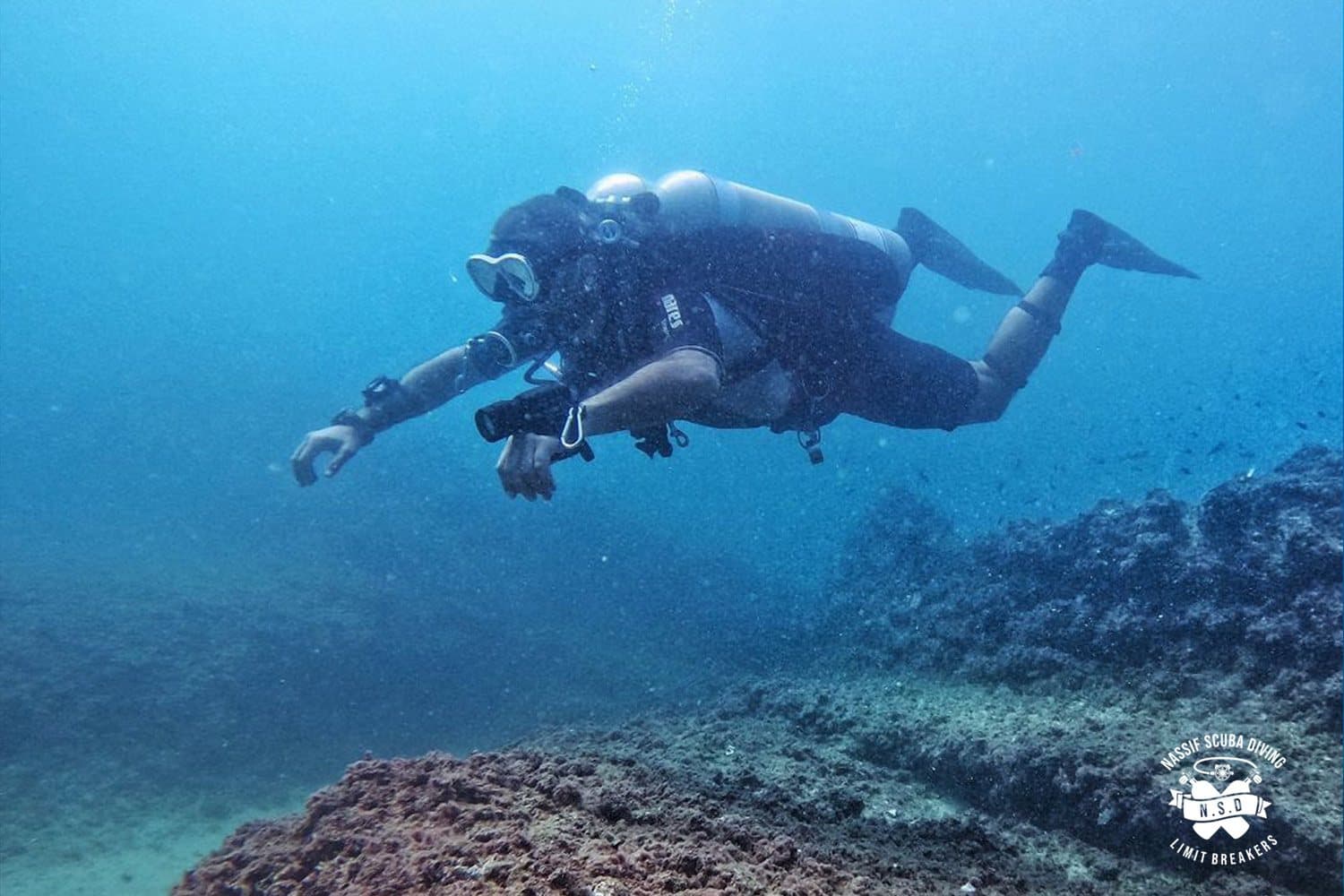 Instructor guiding a diver during a lesson